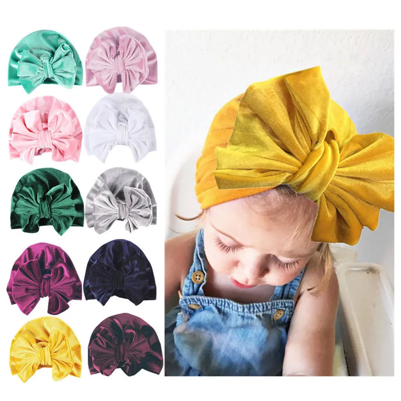 

Cute Velvet Baby Bowknot Hat Newborn Infant Kids Baby Girl Beanie Solid Cap Photo Props
