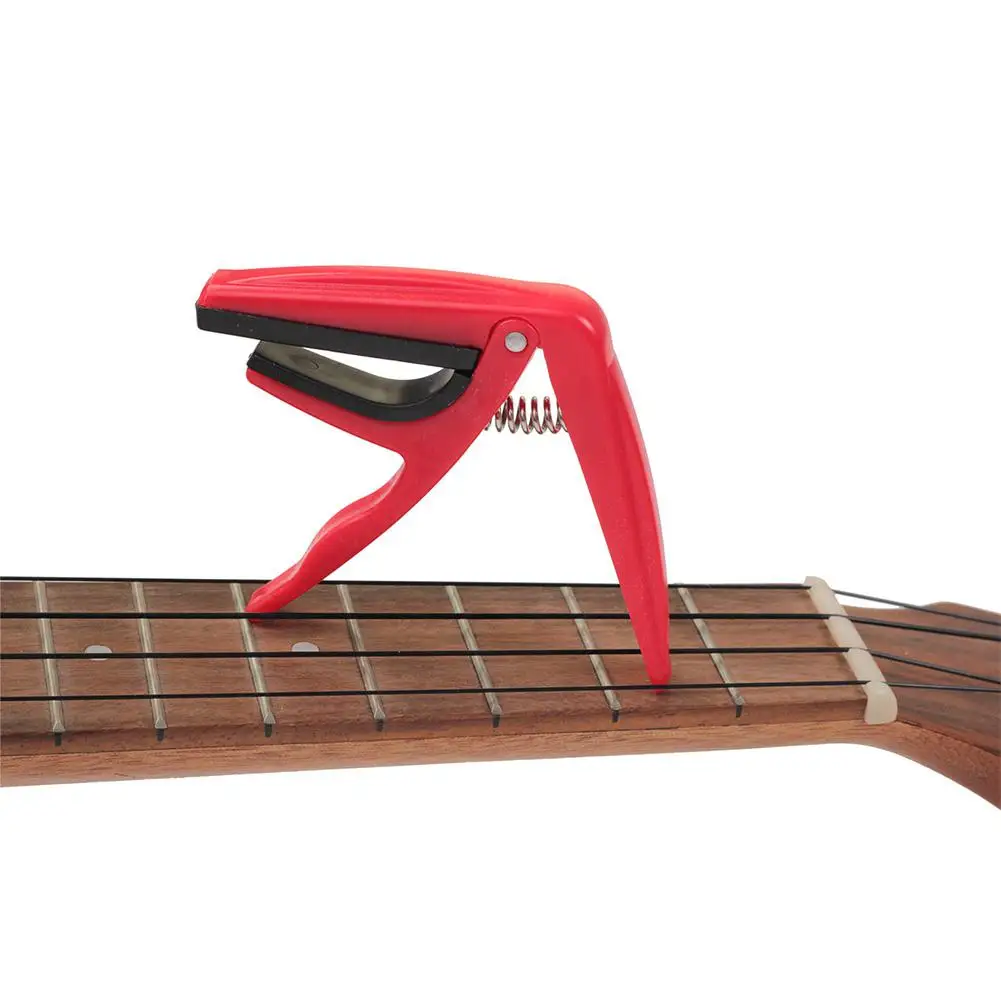 

4 Strings Small Guitar Ukulele Uku Capos Tune Quick Change Capo Key Clamp Mini Guitarra Capos Musical Instrument Accessories