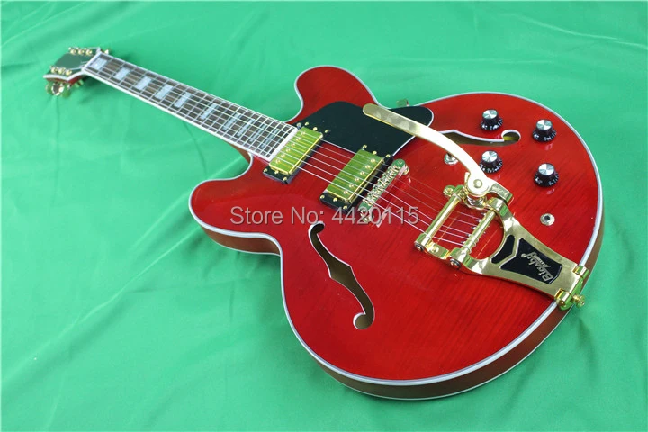 Gleeson studio double sides flamed maple top and back,transparent red color,bigsby tremolo bridge,semi hollow guitar