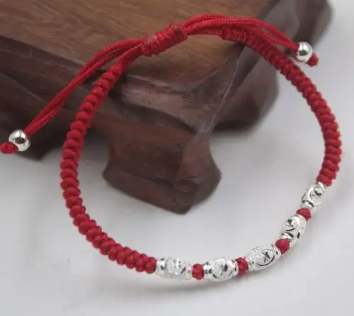 

Solid 925 Sterling Silver Carved Oval Bead Red Cord Knitted Bracelet Adjustable