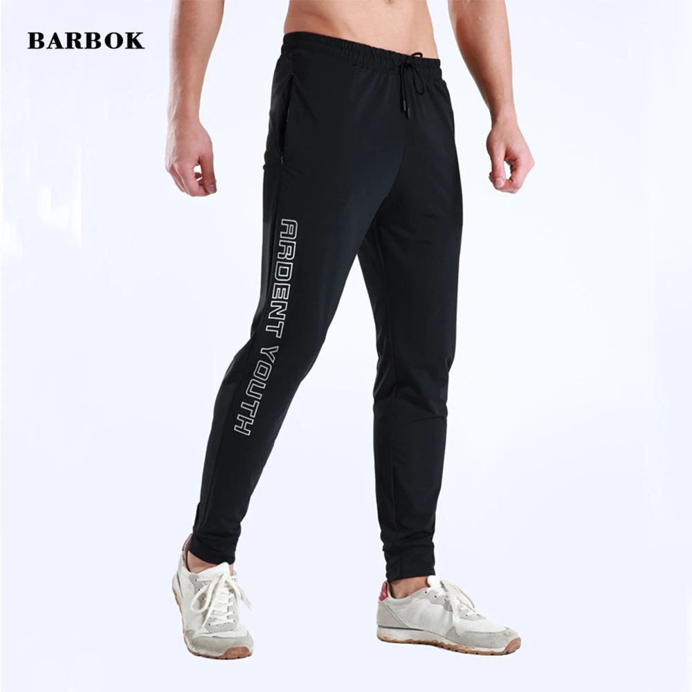 

WOSAWE Men Sports Running Pants Pockets Athletic Fitness Workout Pant Training Pants Elasticity Legging Jogging Gym Trousers