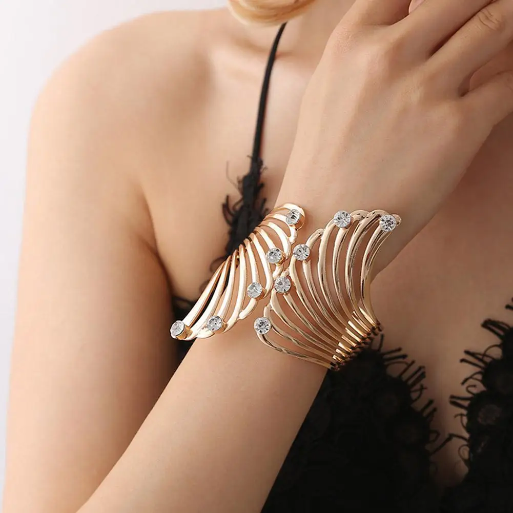 

DreamBell Women Bangle Golden Color Feather Rhinestone Metal Wing Design Bracelet Female Jewelry