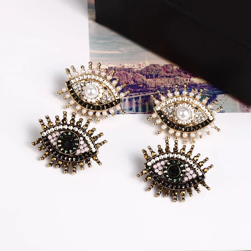 

New European and American eyes short pearl nail temperament hundred earrings ear