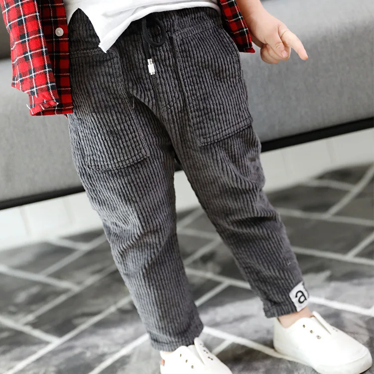 

Children's clothing spring and autumn new 2019 stretch creative foot label pocket boys and girls pants