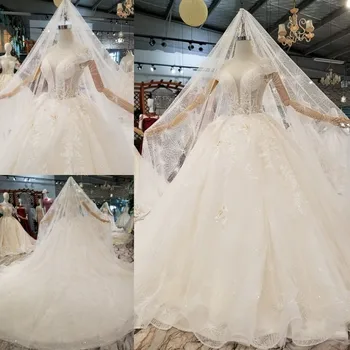 

2019 New White Long Trail Cap Sheelves Backless With Button Design Eppliqued Sequined Beading Pearl With Veil Wedding Dress