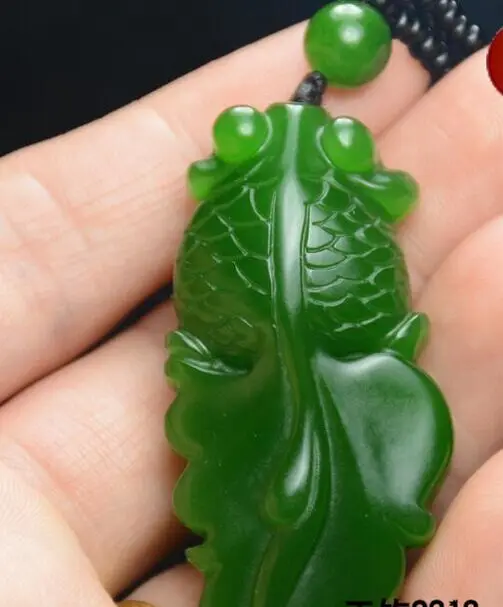 

Asian natural green jade gold fish pendant