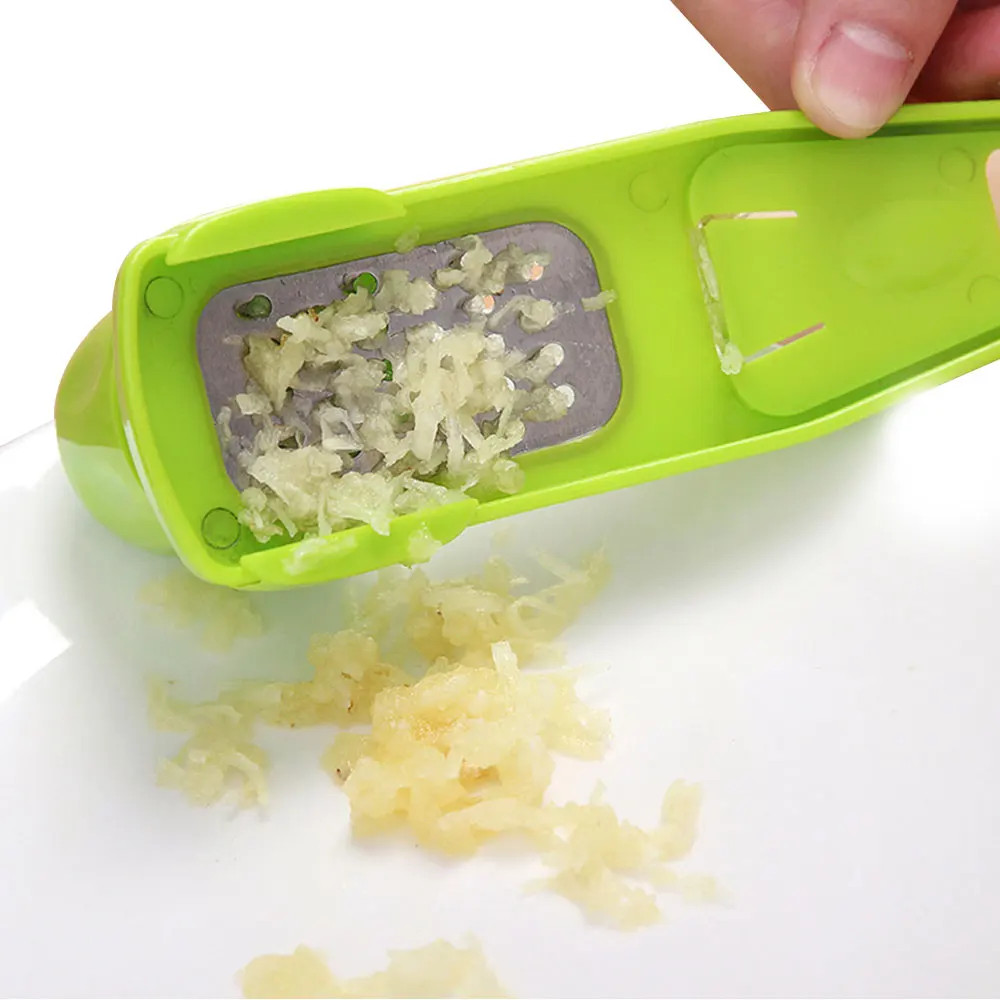 

1PC Multi Functional Ginger Garlic Grinding Grater Planer Slicer Cutter Cooking Tool Utensils Kitchen Accessories (Random Color)