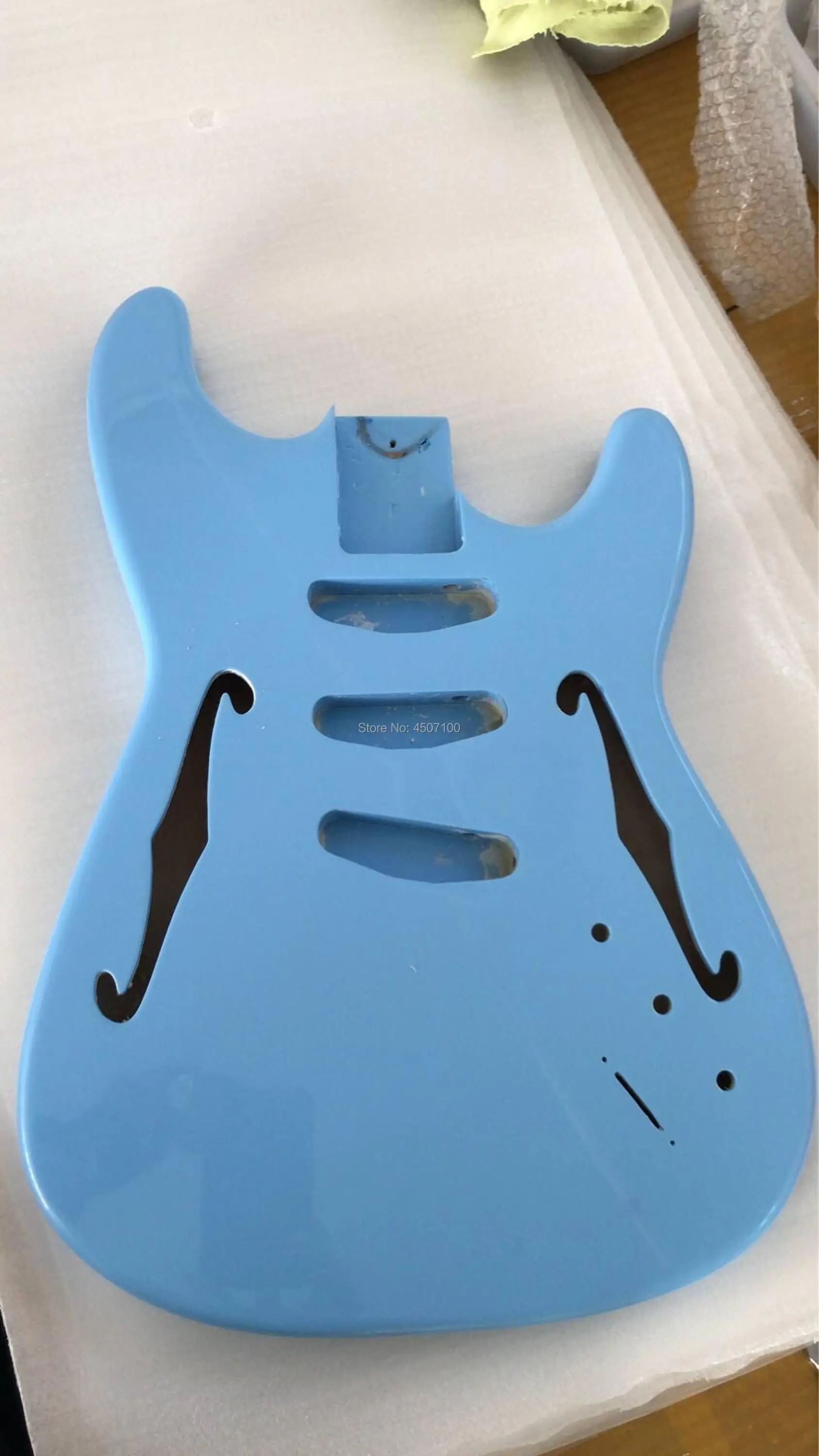 

guitar body only;TL body in blue with F holes;free shipping(can be customized )