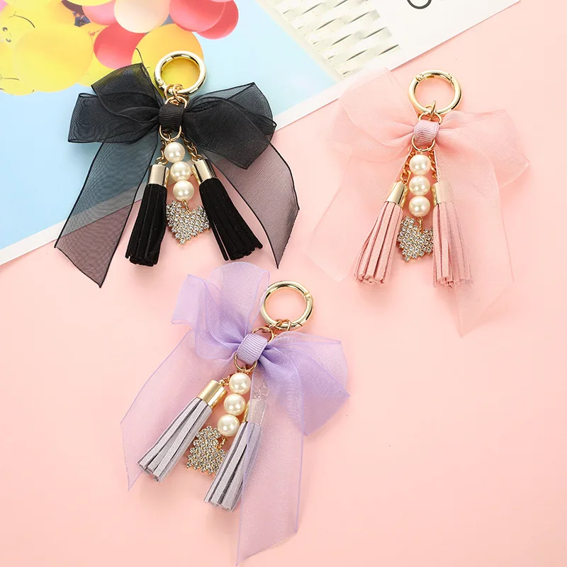 

New Crystal bowknot Keychain Woman Tassel pearl Key Chain Bow Chain Tassel Key Ring Women Bag Car Pendant Jewelry Gifts trinket