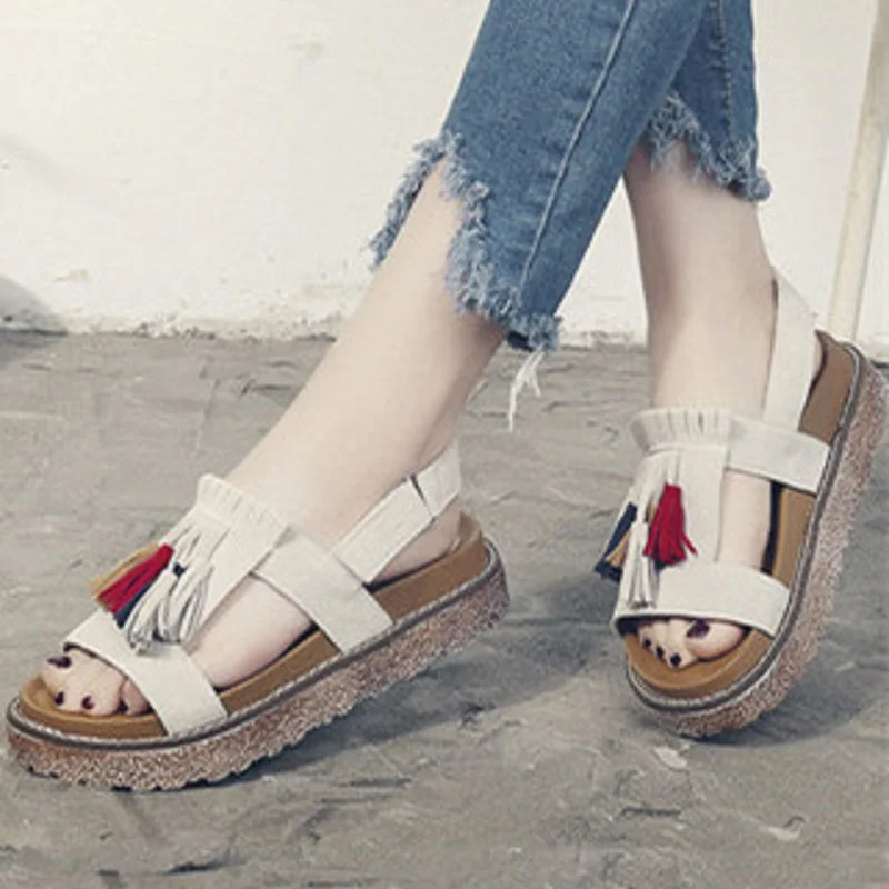 

2019 summer fashion tassel one-shaped open-toe low-heeled flat button wear female sandals