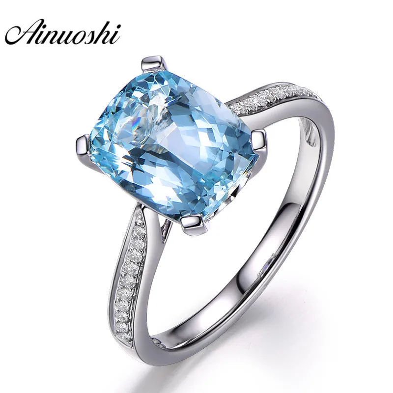 AINUOSHI кольцо из чистого 925 пробы серебра с топазом 4 зубец сверкающий Пасьянс 5ct Подушка огранка Небесно голубой топаз ювелирные изделия, обру... AINUOSHI кольцо из чистого 925 пробы серебра с топазом 4 зубец сверкающий Пасьянс 5ct Подушка огранка Небесно голубой топаз ювелирные изделия, обру...
