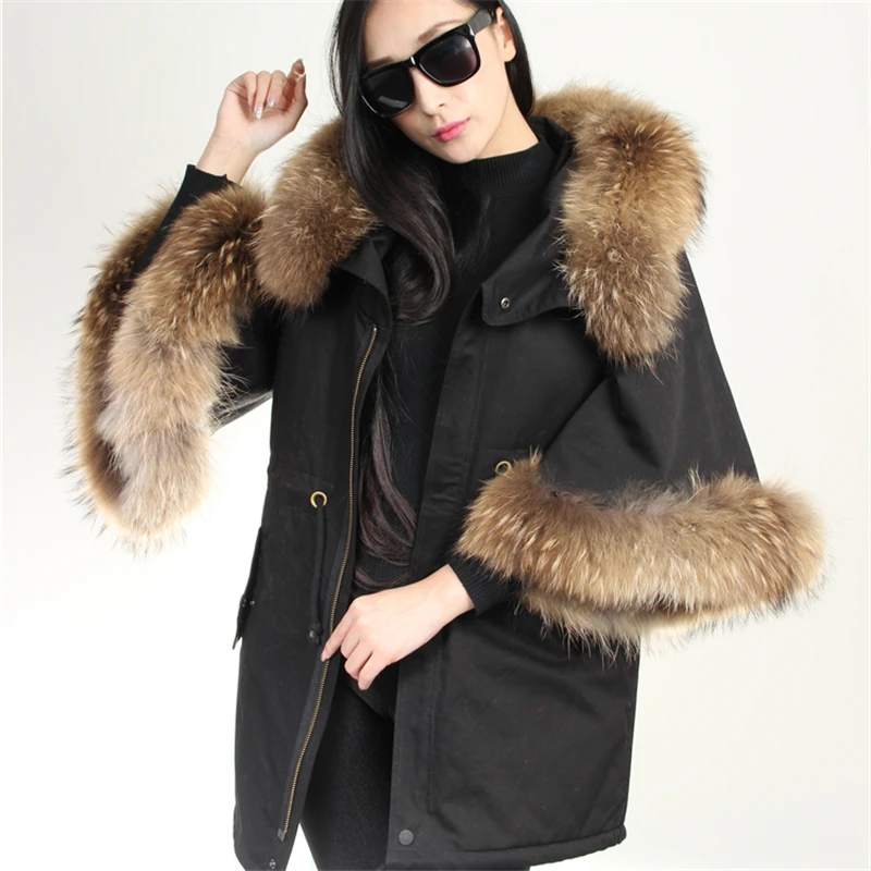 Новое повседневное черное пальто с натуральным мехом зимняя куртка женские расклешенные куртки с длинными рукавами большой натуральный мех енота воротник с капюшоном теплая верхняя одежда
