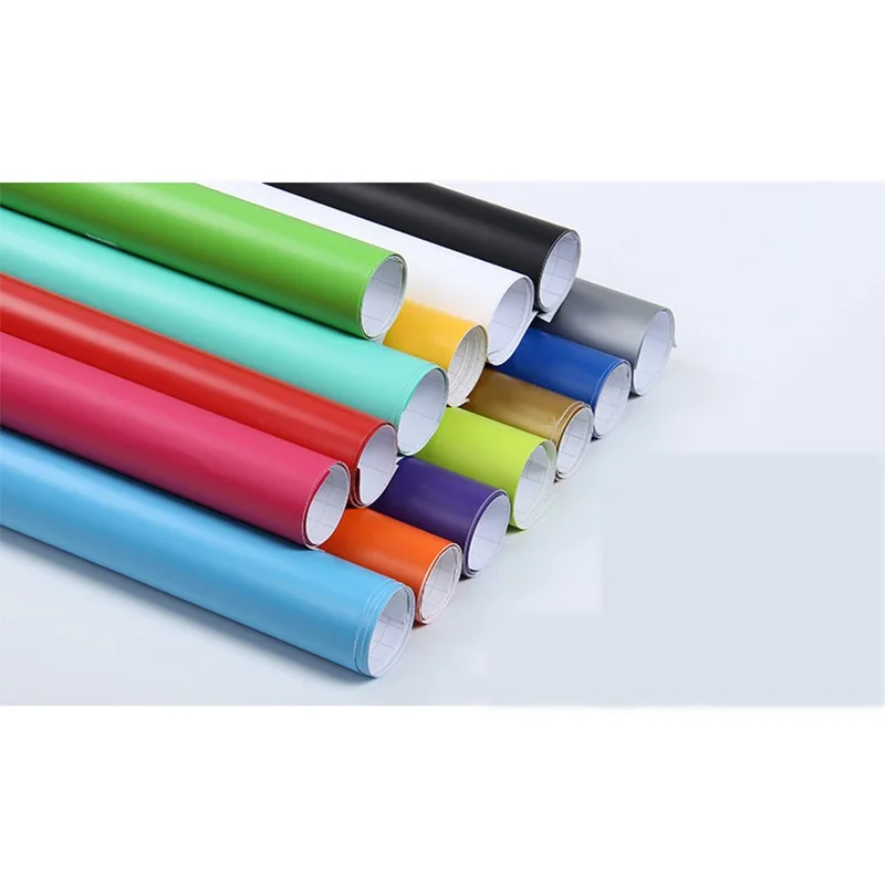 наклейка матовой пленки. прозрачные наклейки. пленка для авто рулон. пленка с черным клеевым слоем. наклейки на прозрачной матовой пленке.