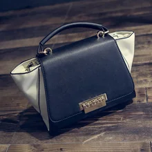 2016 new fall fashion handbags/panelled color wings trend handbag/shoulder lock trapeze women messenger bag/black PU leather bag