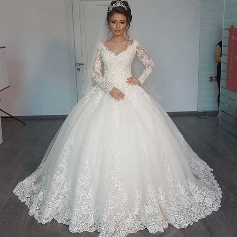 

Gorgeous Sheer Ball Gown Wedding Dresses 2017 Puffy Lace Beaded Applique White Long Sleeve Arab Wedding Gowns robe de mariage