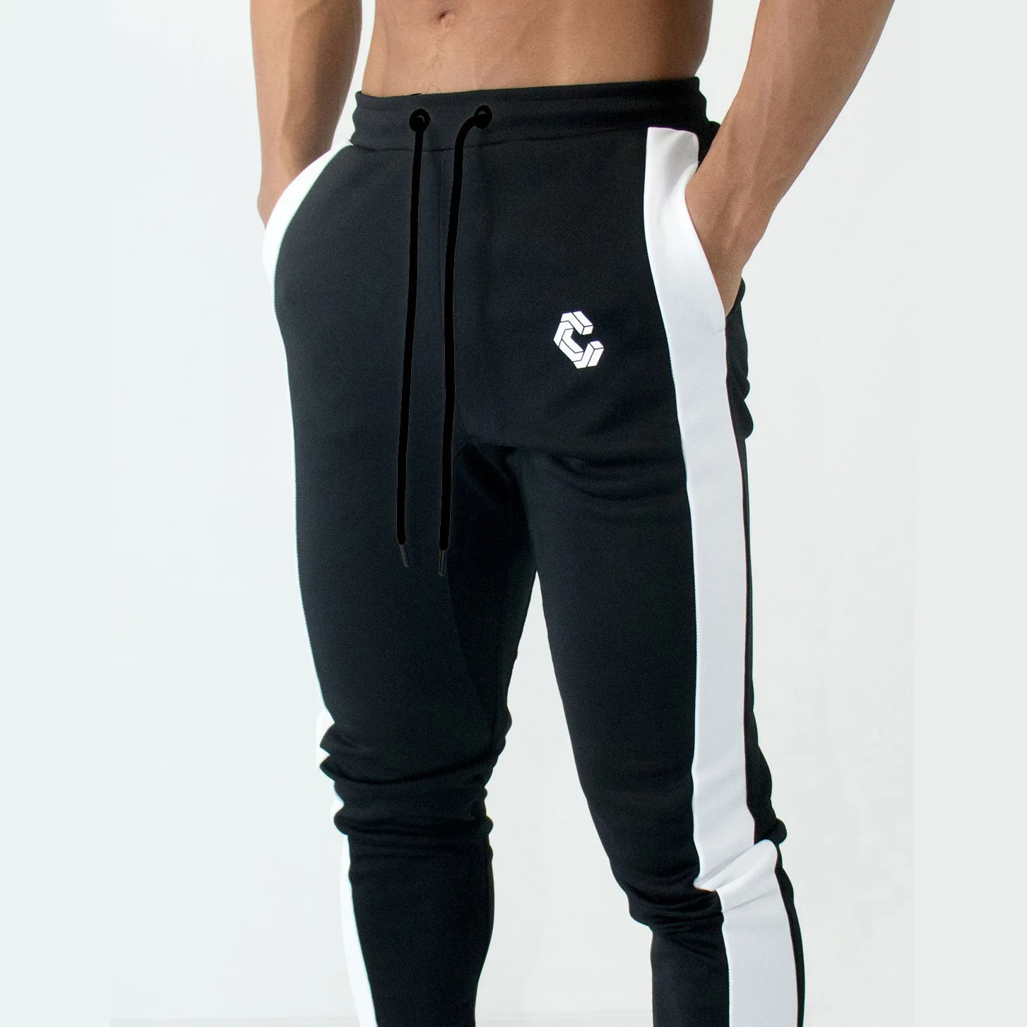 رجل ركض سراويل تقليدية اللياقة البدنية الرجال الرياضية قيعان نحيل Sweatpants السراويل الأزياء صالات رياضية عداء ببطء السراويل الترنك