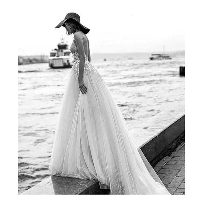 2019-beach-wedding-dresses-with-3d-floral-spaghettitiered-skirt-backless-plus-size-elegant-garden-country-toddler-wedding-gowns (3)