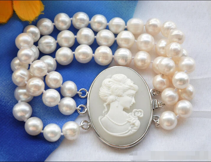 

Z5558 NATURAL 3row 8" 10mm WHITE ROUND FRESHWATER PEARL BRACELET e SHIPPING 5.25