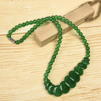 

Dark green circular with a Prefixes of all sizes plus beads of the same size Malaysia Jasper necklace, can be a holiday gift