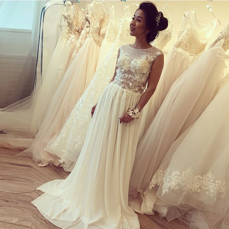 

Illusion Long Wedding Dress Sleeveless Vintage Appliques Beach Bridal Dress Buttons Back Robe De Mariee For Summer Wedding 2019