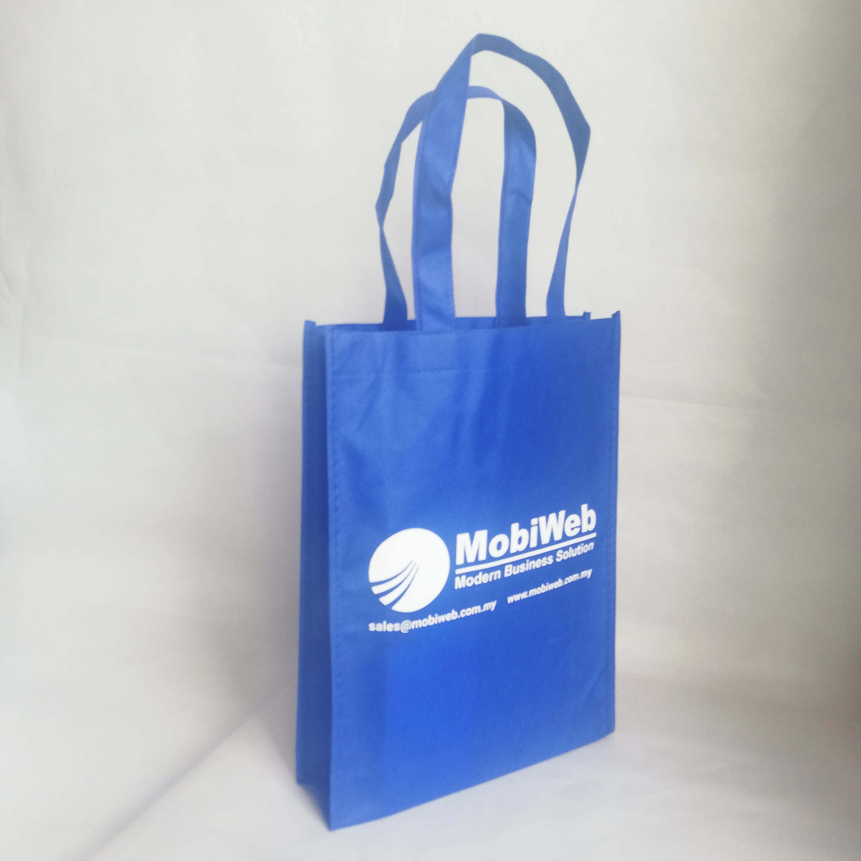 

1000pcs/lot 32HX24X8cm Blue Non-Woven Tote Bags in Shopping Reusable Grocery Store Promotional Bag for Trade Show and Wedding