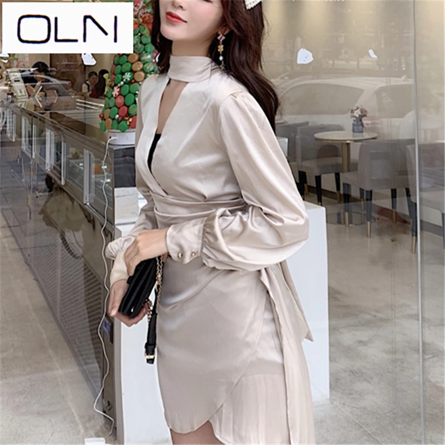 

New spring and summer hanging neck hollow V-neck lantern sleeves pleated satin laced waist irregular sexy OL Office Lad dress