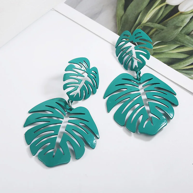 

New Women Hollow tree leaves long pendant earrings fashion Jewelry Wholesale