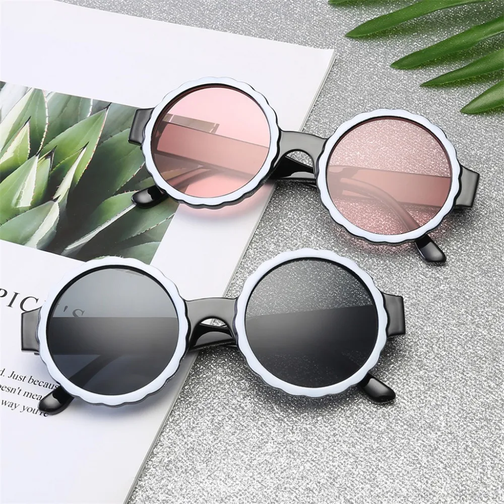 

Women's new round sunglasses fashion retro men's and women's sunglasses integrated air mirror glasses frame women L0306