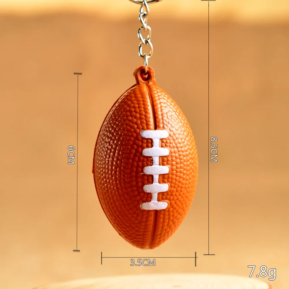 شحن مجاني أحدث بو البسيطة كرة القدم الأمريكية على شكل سلاسل المفاتيح الرجبي أقراط لتعزيز الهدايا