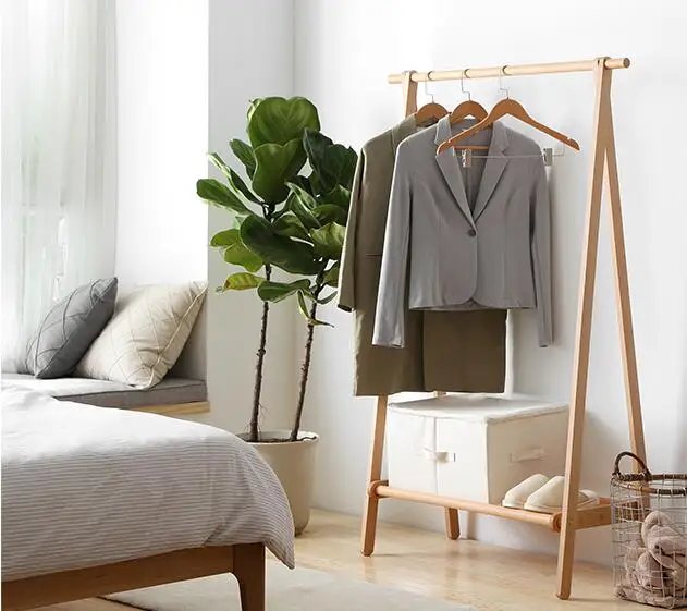 

Solid wood floor clothes. Bedroom multi-functional province space for the use of clothes bag shelves..