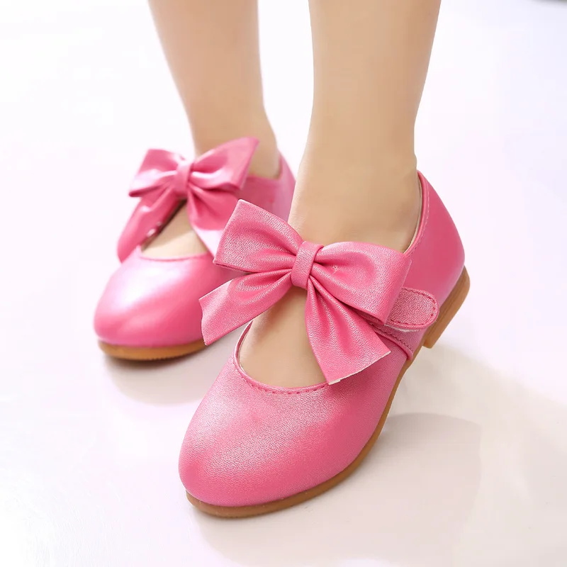 pink trainers with bows