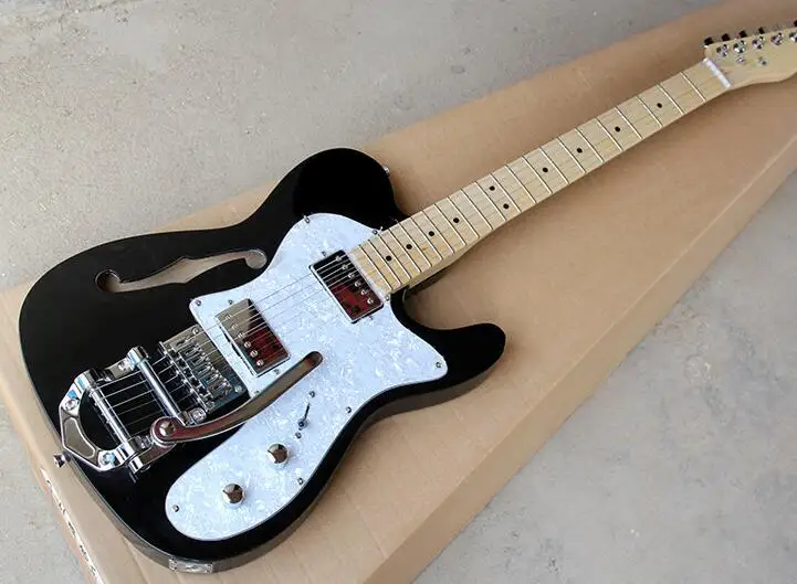 

Factory custom Black Electric Guitar with White Pearl Pickguard,Maple Fretboard,TremoloSyetem,Chrome Hardware free shipping