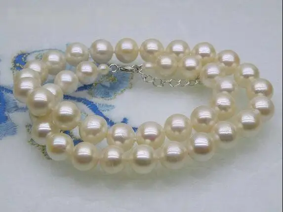 

FREE SHIPPING HOT sell new Style >>>>> Pretty 6-6.5mm AAA+ round white akoya pearl necklace 17