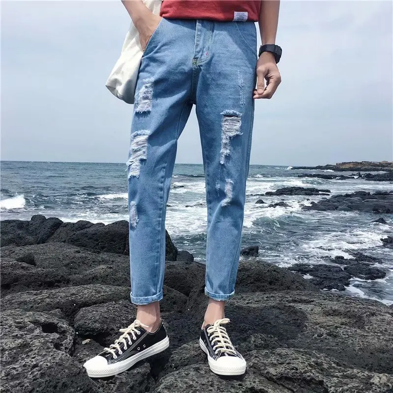 

Wholesale 2020 Spring autumn boys teenagers Male Korean feet men's trousers jeans ripped hole loose handsome cow pencil pants