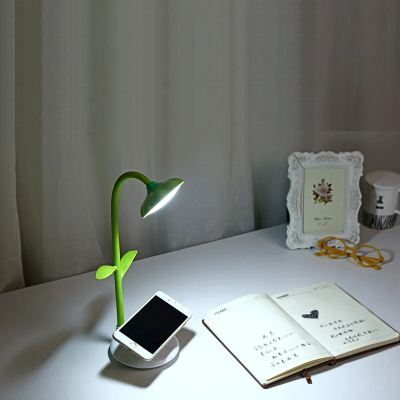 

Sunflower desk lamp Mobile scaffold small desk lamp mini USB small night light learn the reading desk lamp that shield an eye