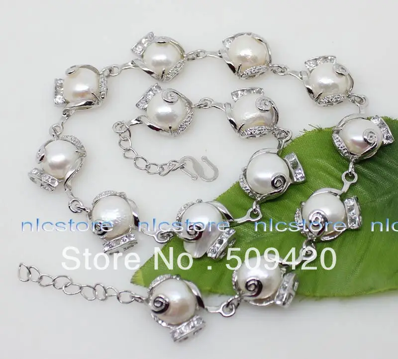 

Free ShippingWhite baroque pearls & GP chains necklace 18