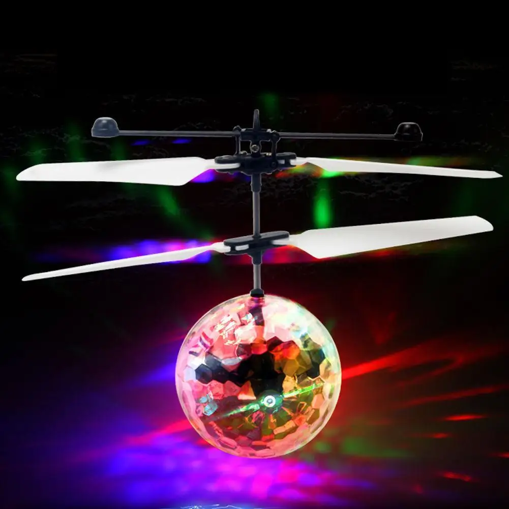 VCB Linda Expresión Facial Inducción Infrarroja Flying Flash Disco LED Ball Toy Amarillo 
