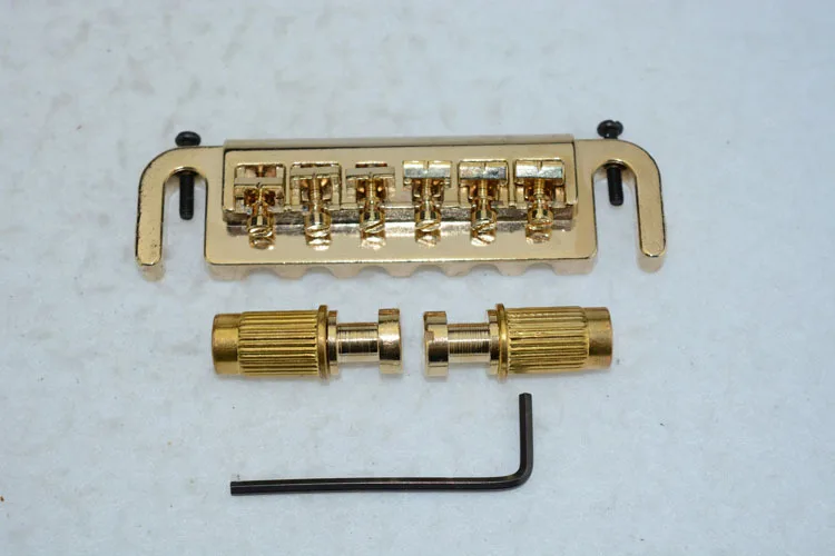 

One-piece Lp guitar bridge Lp is drawing board one-piece Lp code 6 string Lp bridge golden bridge
