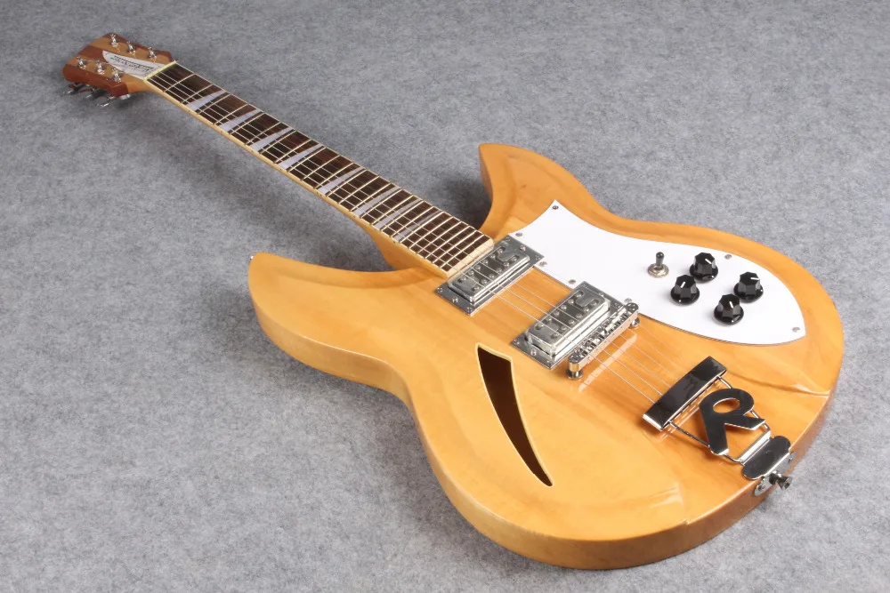 

Natural Color style 6 string electric guitarra Maple neck with mahogany stripe free shipping