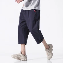 Мужские капри, брюки длиной до икры, повседневные черные однотонные брюки с эластичной резинкой на талии, брюки для мужчин, Япония, мода, большие размеры 5XL