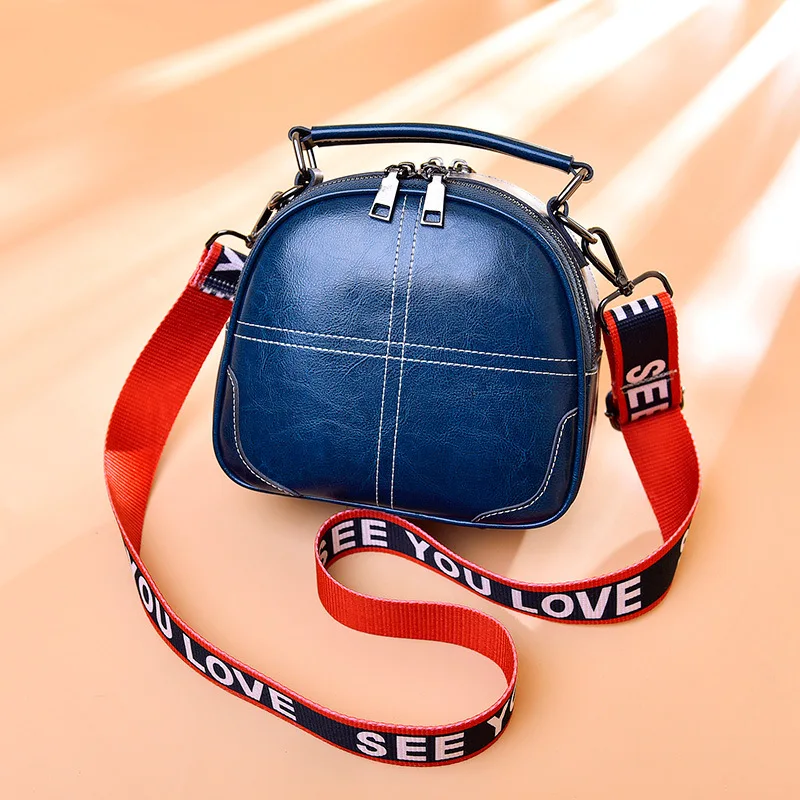 

Leather fashion new style lady cowhide Korean version handBags with one shoulder inclined small round embroidery thread