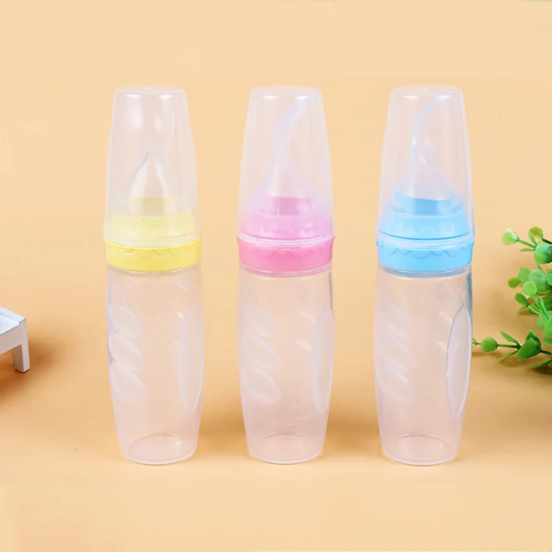 New Baby Feeding Bottle Cup Baby Squeeze Spoon Milk Safety Bottles