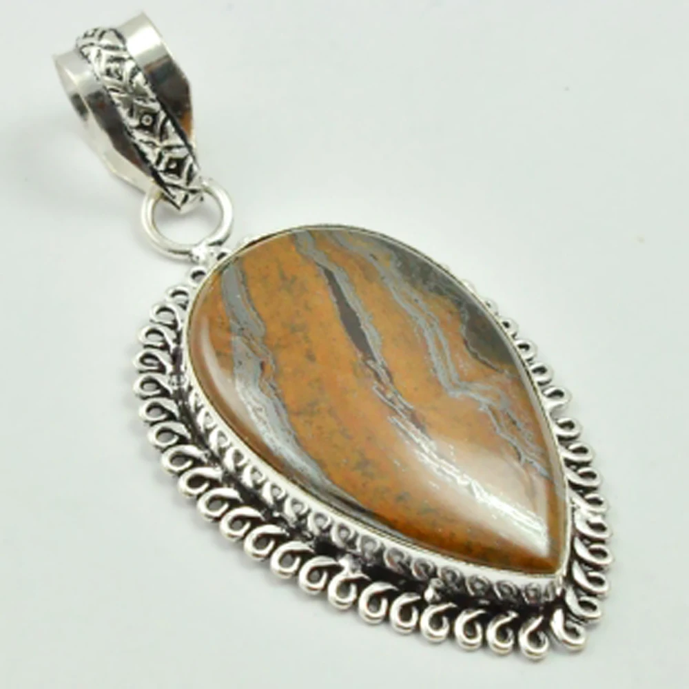 

Iron Tiger Eye Pendant Silver Overlay over Copper , 56 mm, P3043