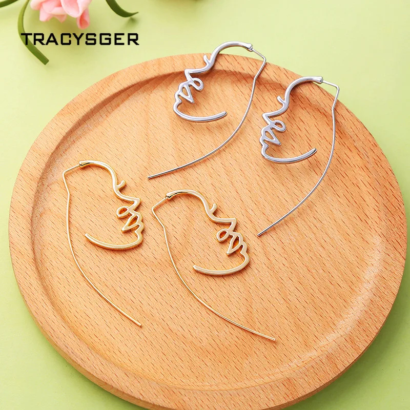 

AB-ed00757c /TRACYSGER/ Creative Alloy Hollow Face Earrings