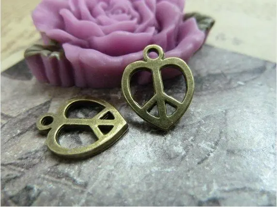 50pcs 14x13mm Antique Bronze Lovely Mini Peace Heart Symbol Charms Pendant c1168 |