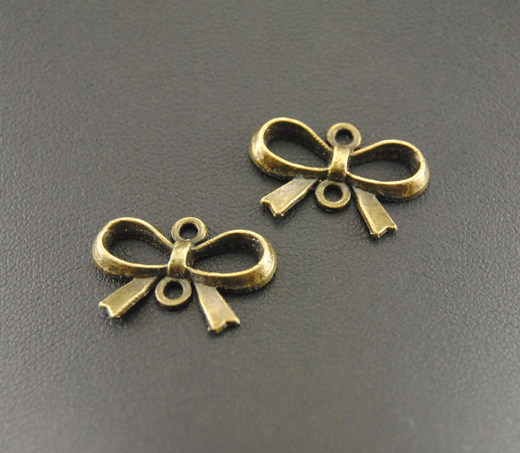 

15 Pcs Antique Bronze Alloy Bow Charm Connectors Charms For DIY Handmade Jewelry A324