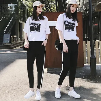 

Set Female 2018 Spring And Summer New Casual Fashion Short-sleeved Bottoming Shirt + Striped Pants Feet Temperament Two-piece