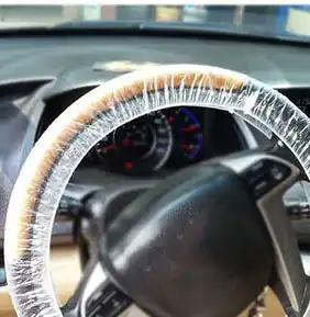 1000pcs/lot Universal white plastic disposable plastic steering wheel cover steering wheel cover 4S shop dedicated