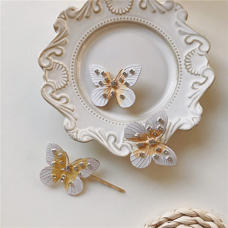 Rongho окрашенные металлические серьги-гвоздики с бабочкой для женщин Кристалл Brincos модные ювелирные изделия Модные серьги с насекомыми