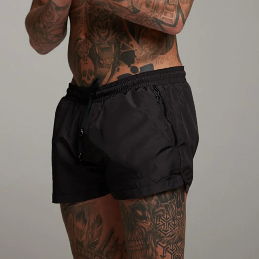 Большие размеры Мужские брендовые шорты дышащая спортивная одежда шорты до середины икры на молнии Фитнес Бодибилдинг Беговые брюки в повседневном стиле шорты для тренировок